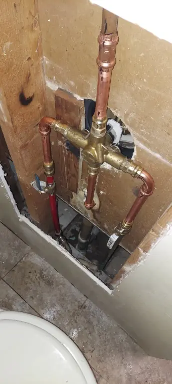 New copper shower valve during a bathroom remodel